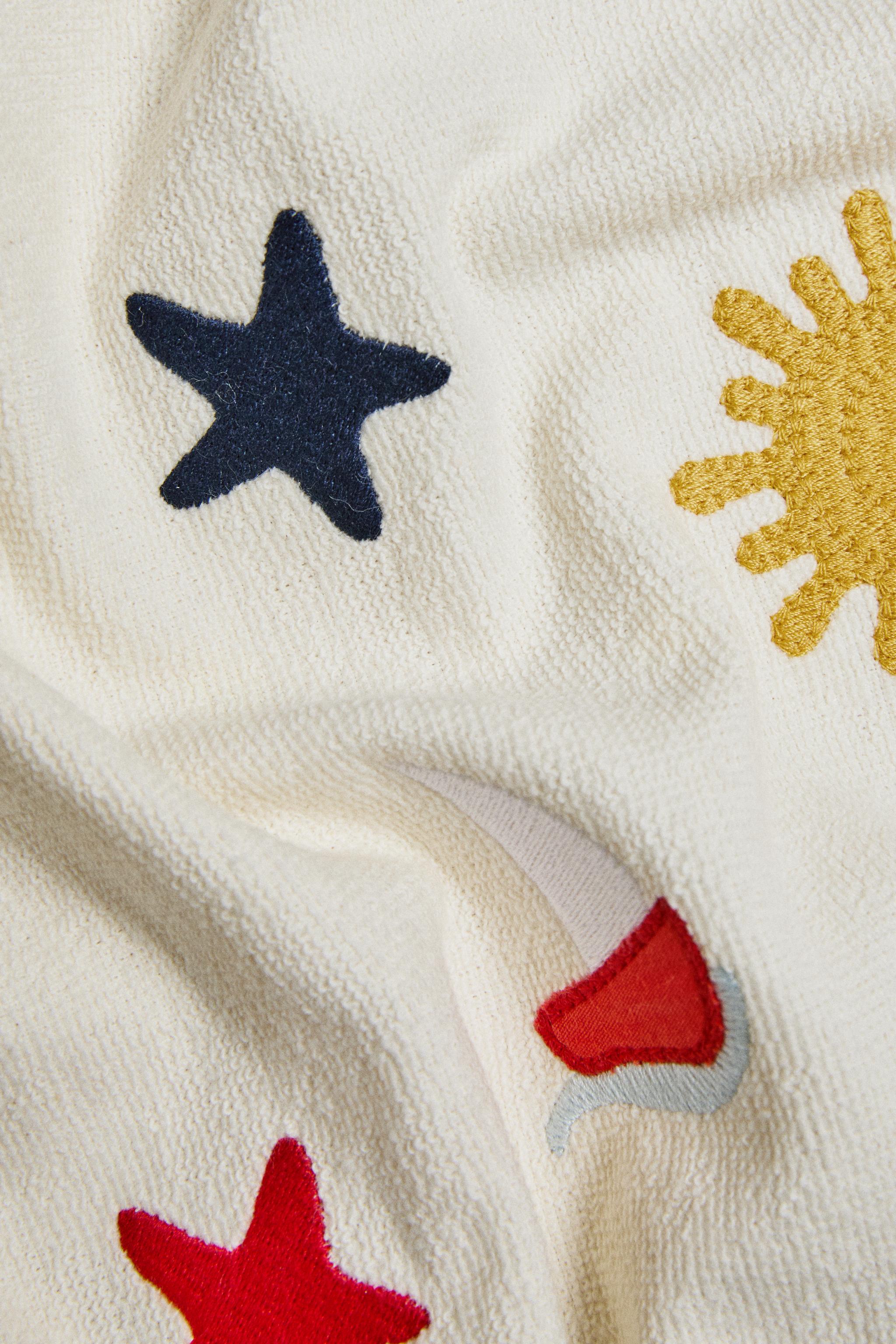 COTTON BEACH TOWEL WITH FIGURES